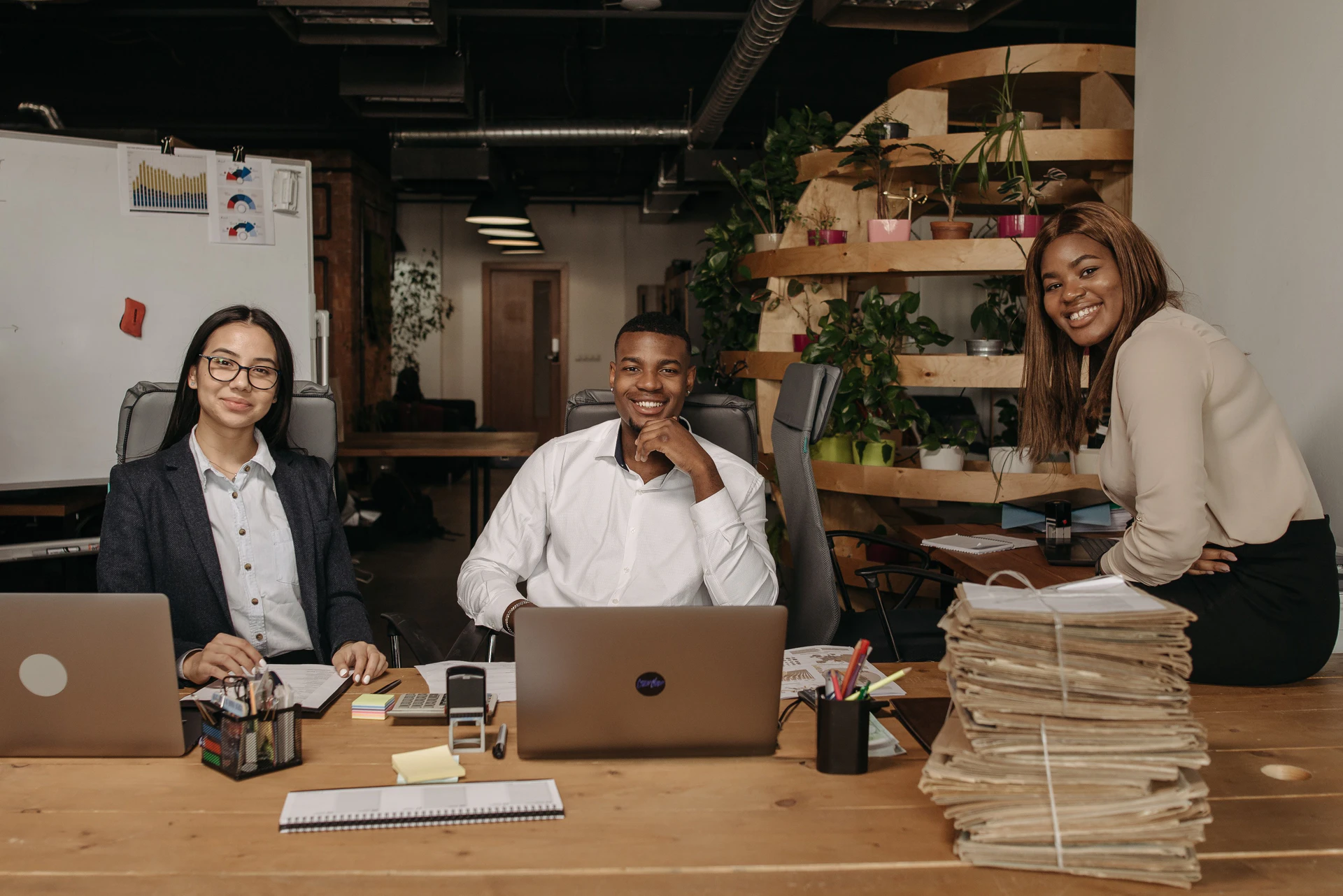 NexHRM team collaborating in the office